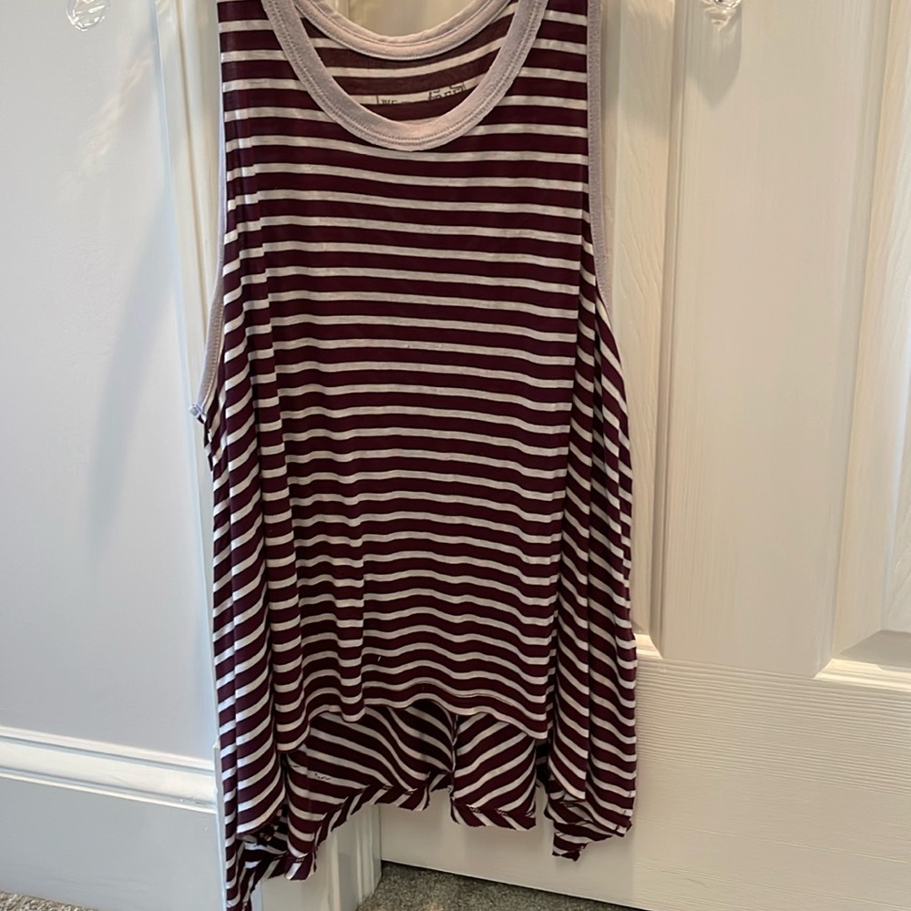 We the free. Size large. High low shirt.